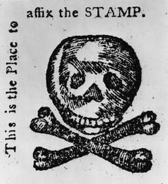 A printed stamp showing a skull and crossbones with text reading 'This is the Place to affix the STAMP.' This protest imagery symbolized colonial opposition to the Stamp Act, portraying the tax as deadly to colonial liberty.